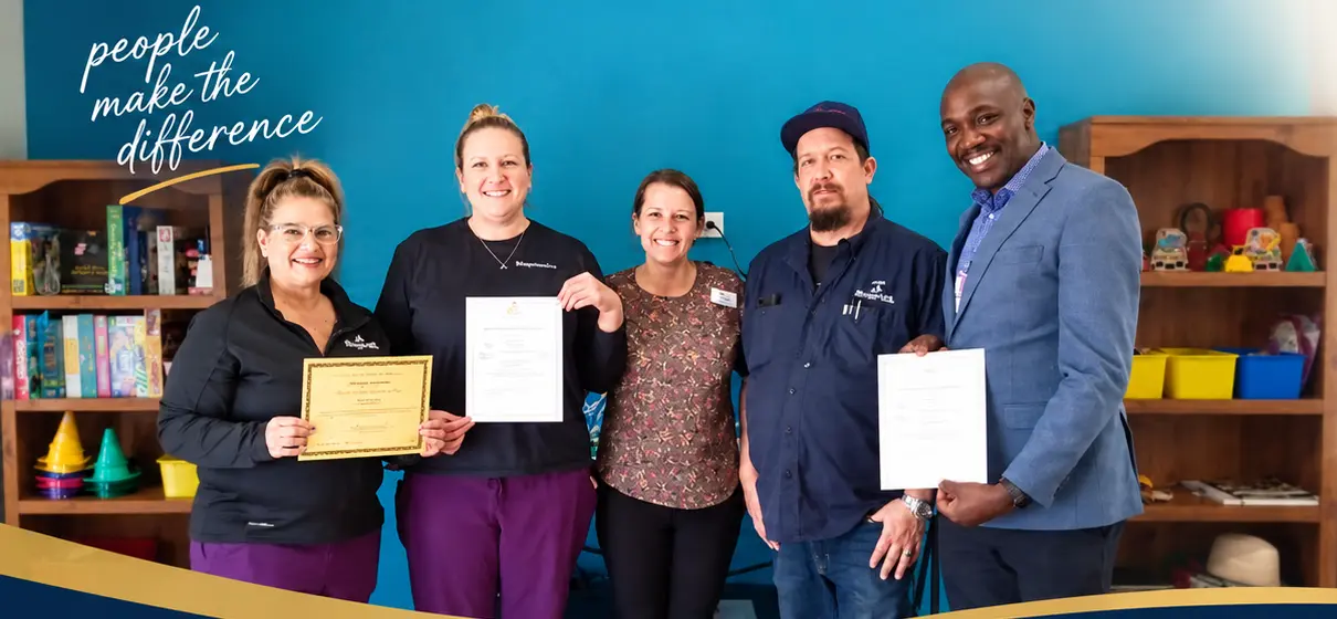 MeadowLark Care Homes staff receiving a KDADS zero-deficiency certificate